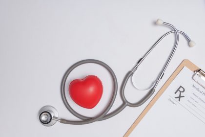 stethoscope with heart stethoscope red heart wooden table hospital life insurance concept world heart health day idea medicine pharmacy concept empty medical form ready be used scaled